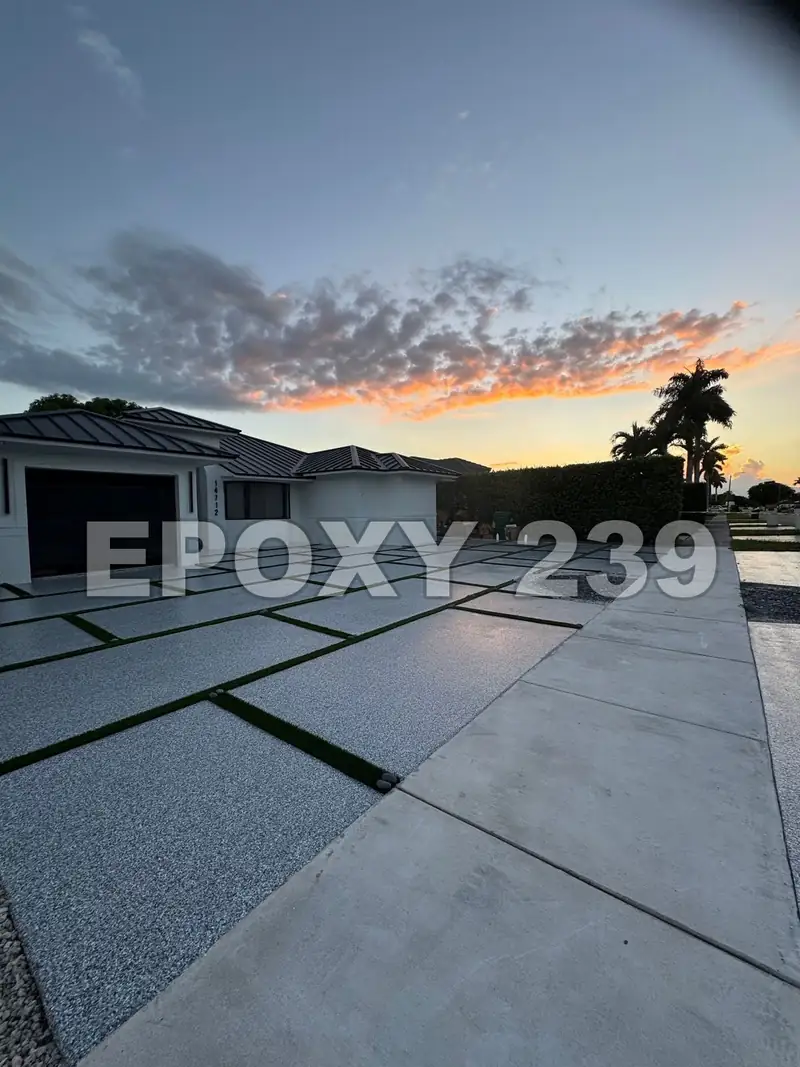 Driveway pads in Gravel flake epoxy at sunset